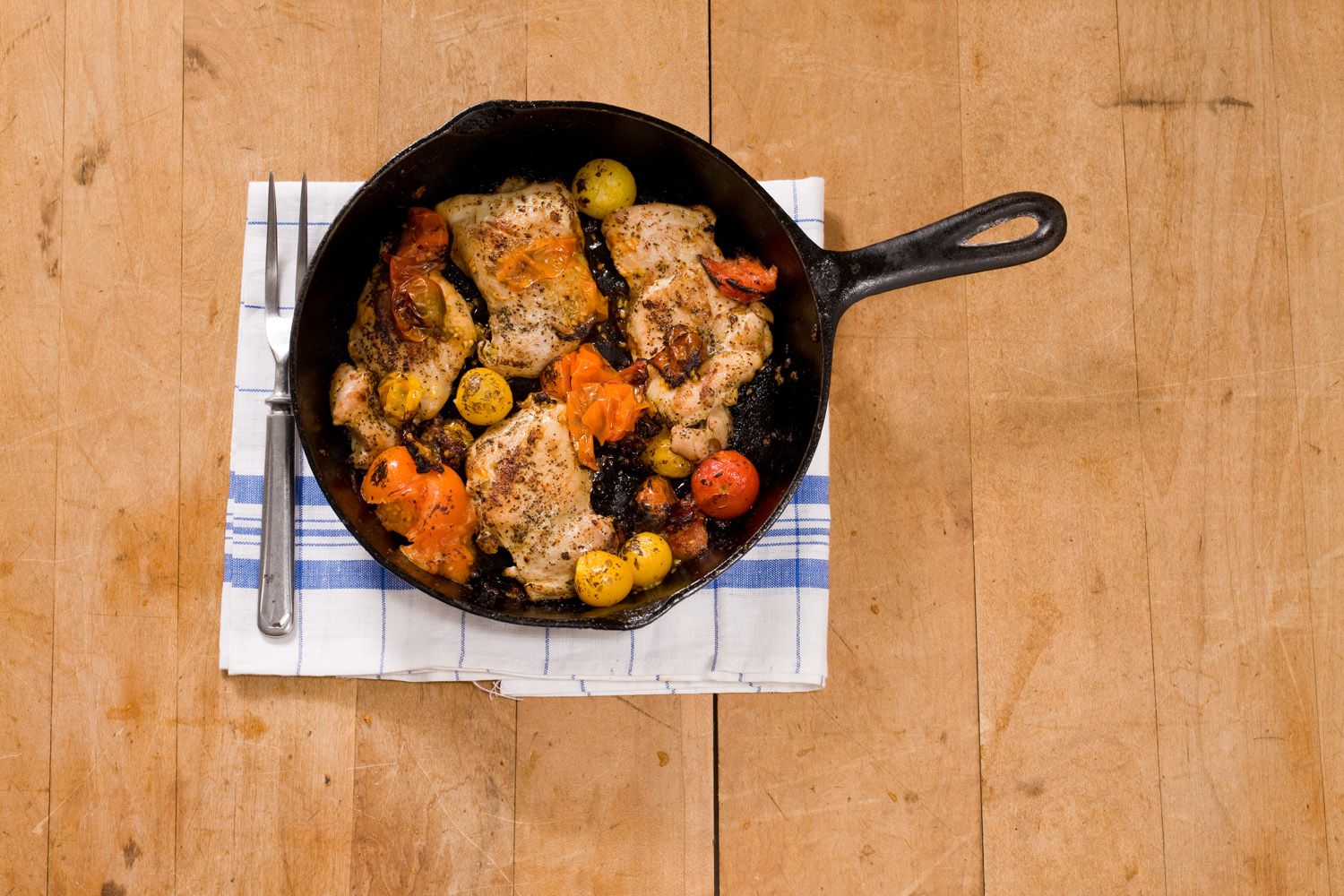 Chicken Thighs with Cherry Tomatoes Recipe - Easy Kitchen